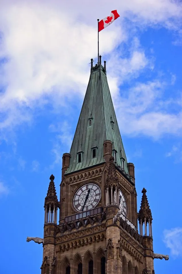 The Peace Tower on Parliament Hill, Ottawa, flying the Canadian flag
