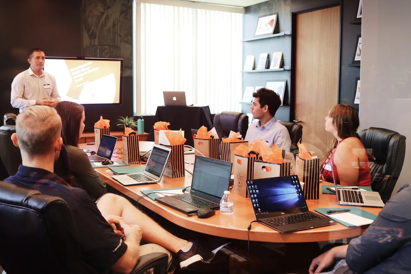 A Canadian financial-services team in a boardroom review